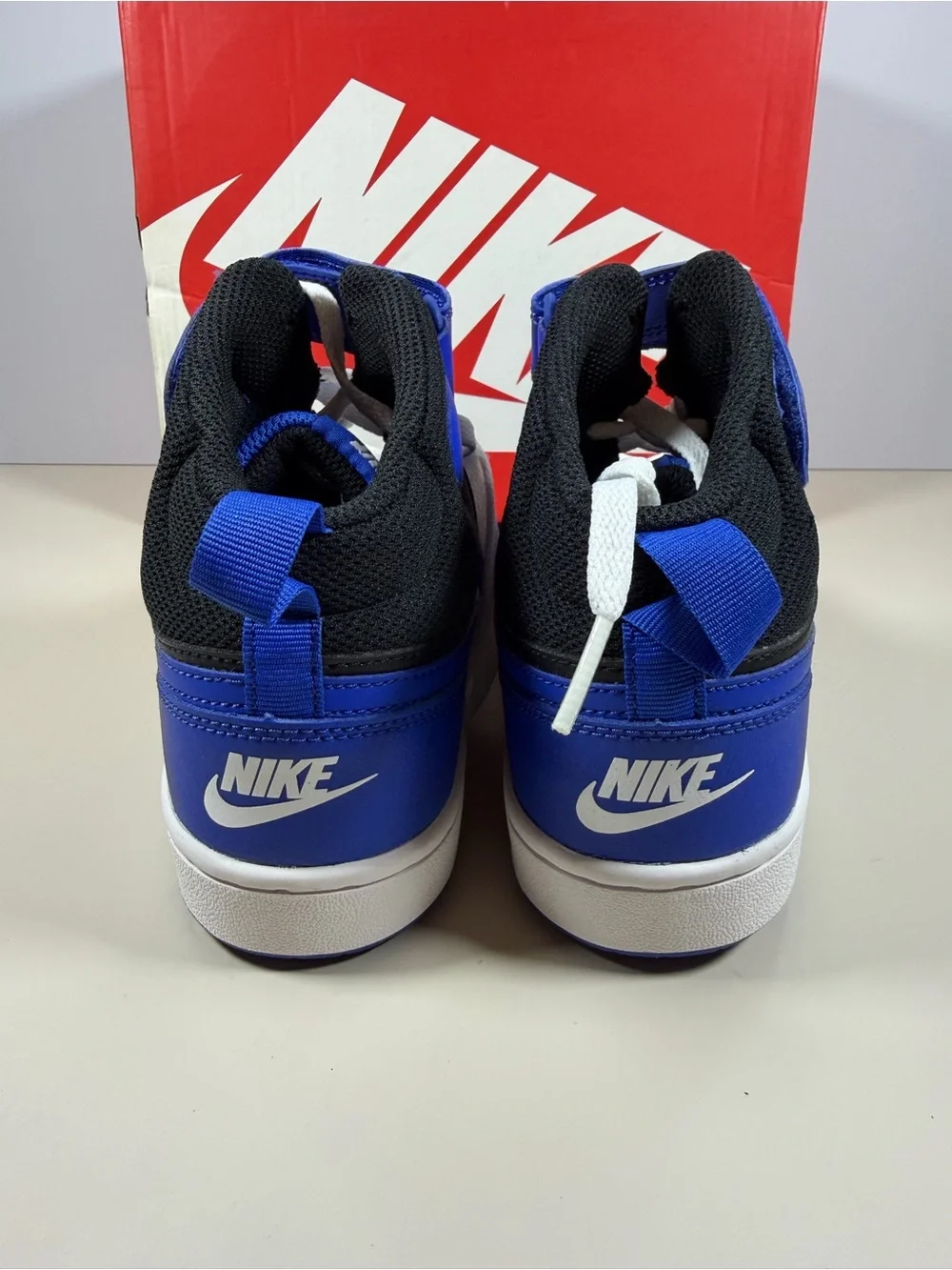 Nike Kids High-Top Sneakers in Black and Royal Blue with White Laces